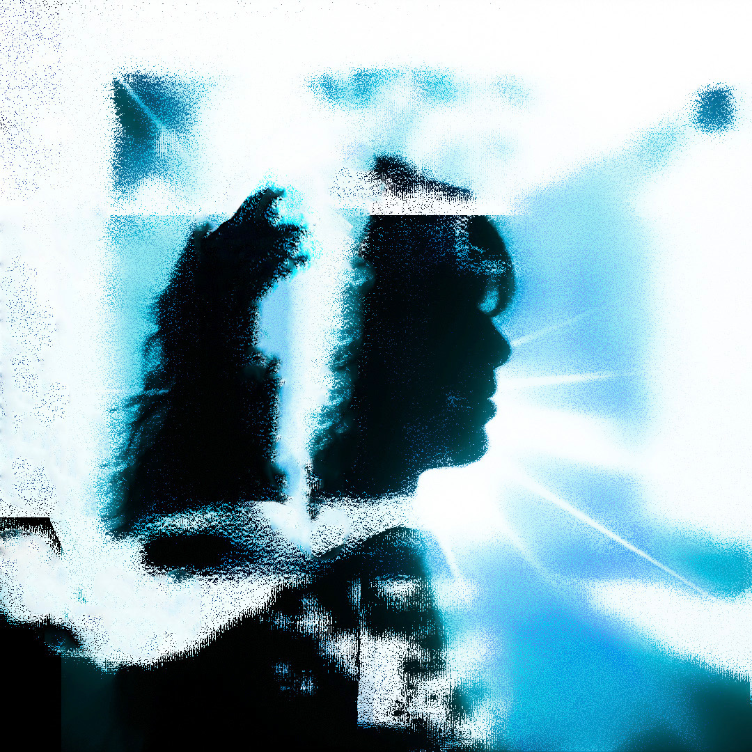 dhruvy in profile, washed in electric blue and white light